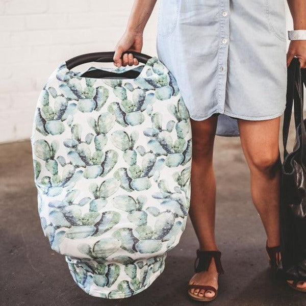 Man holding a baby carrier bag