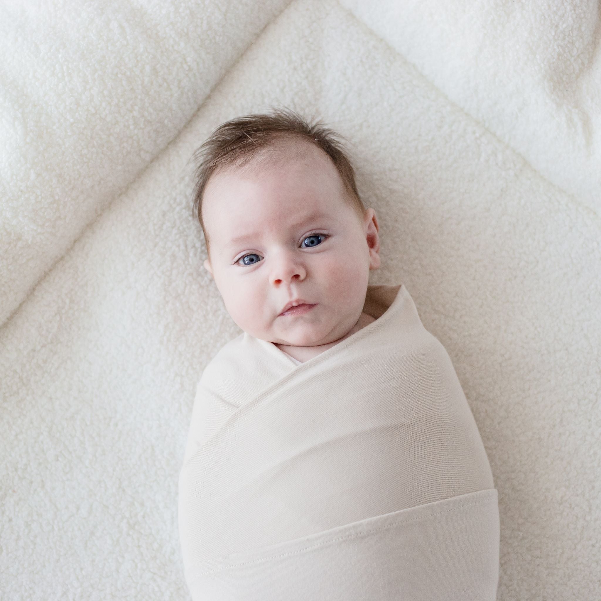 Baby wearing Stretchy Swaddle Baby Blanket