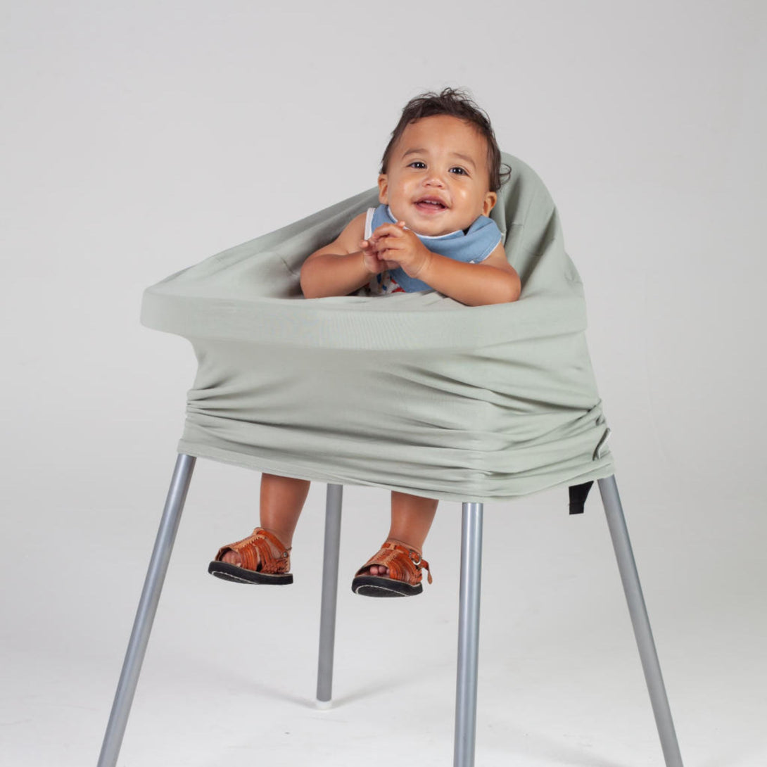 Baby sitting in 5 in 1 multi use cover