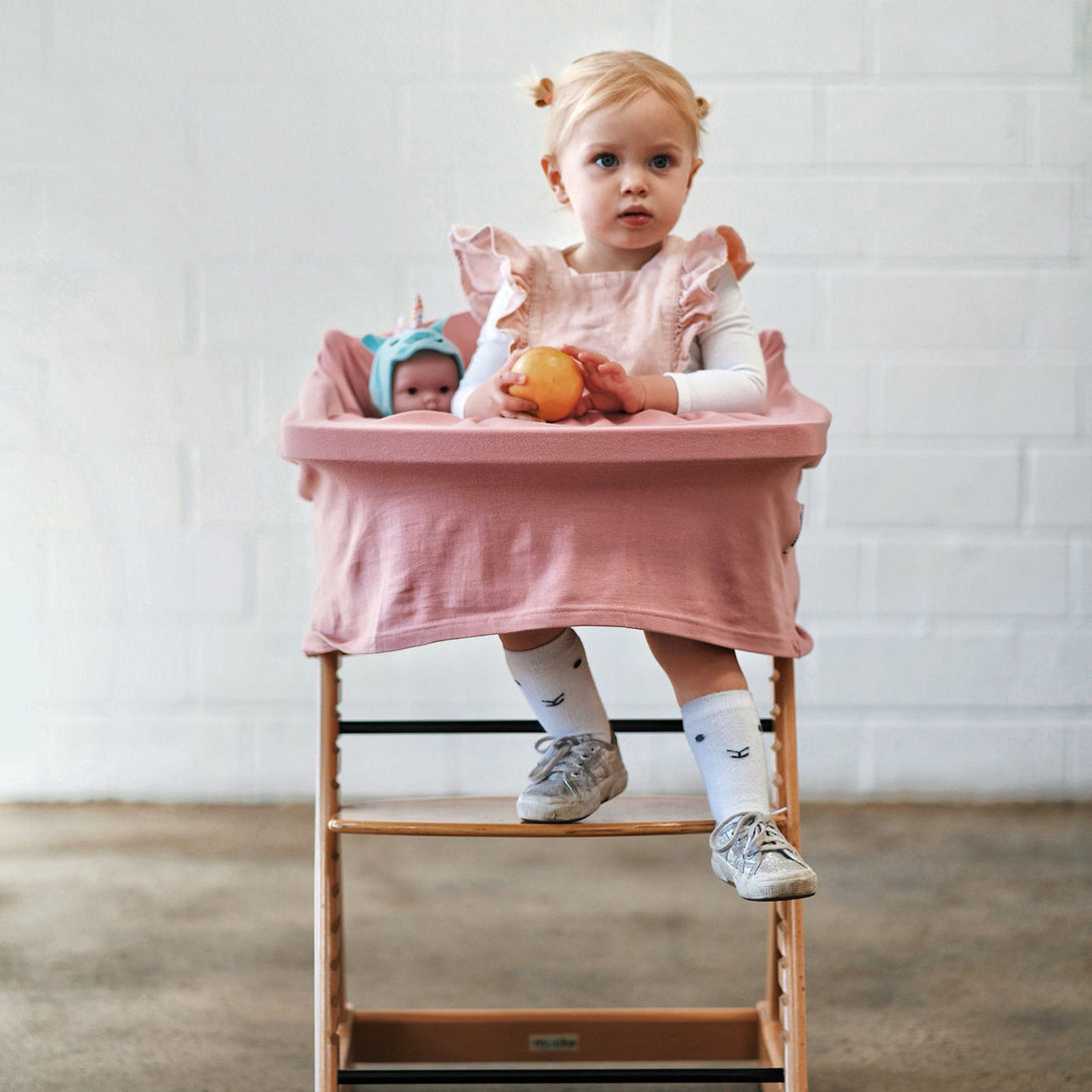 Little Girl sitting in 5 -1 Pink Table chair