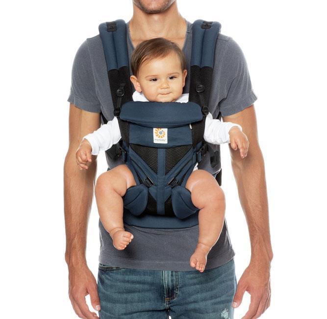 Man wearing Ergobaby All Position OMNI 360 Cool Air Mesh Baby Carrier