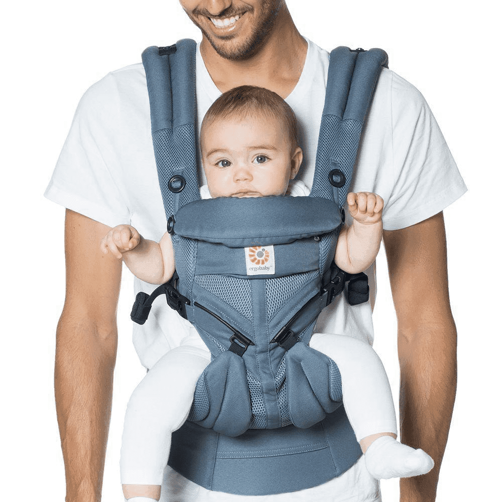 Man wearing Ergobaby All Position OMNI 360 Cool Air Mesh Baby Carrier in blue color